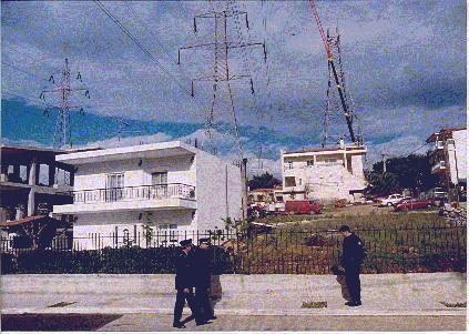 A photograph of a power line appears here