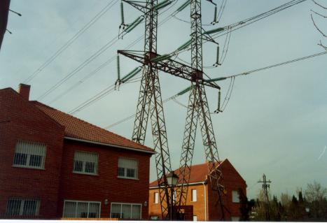 A photograph of a power line appears here